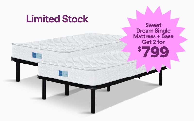 2 white and black beds on an angle with a pink starburst showing they are on sale for $799.